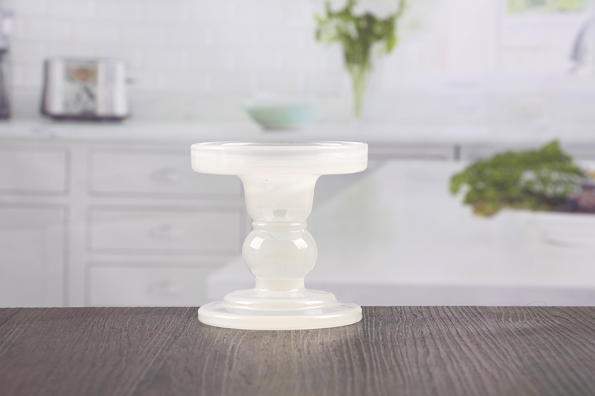 White pillar candle holders