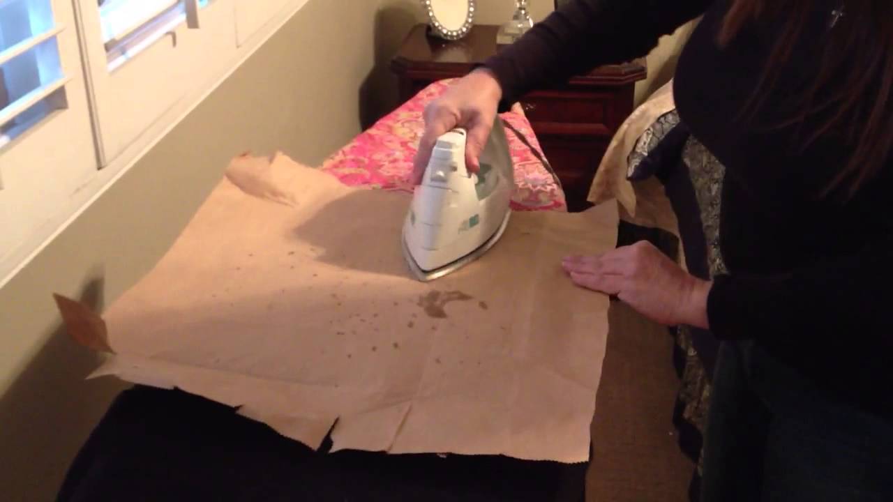 How do you remove candle wax from clothing?