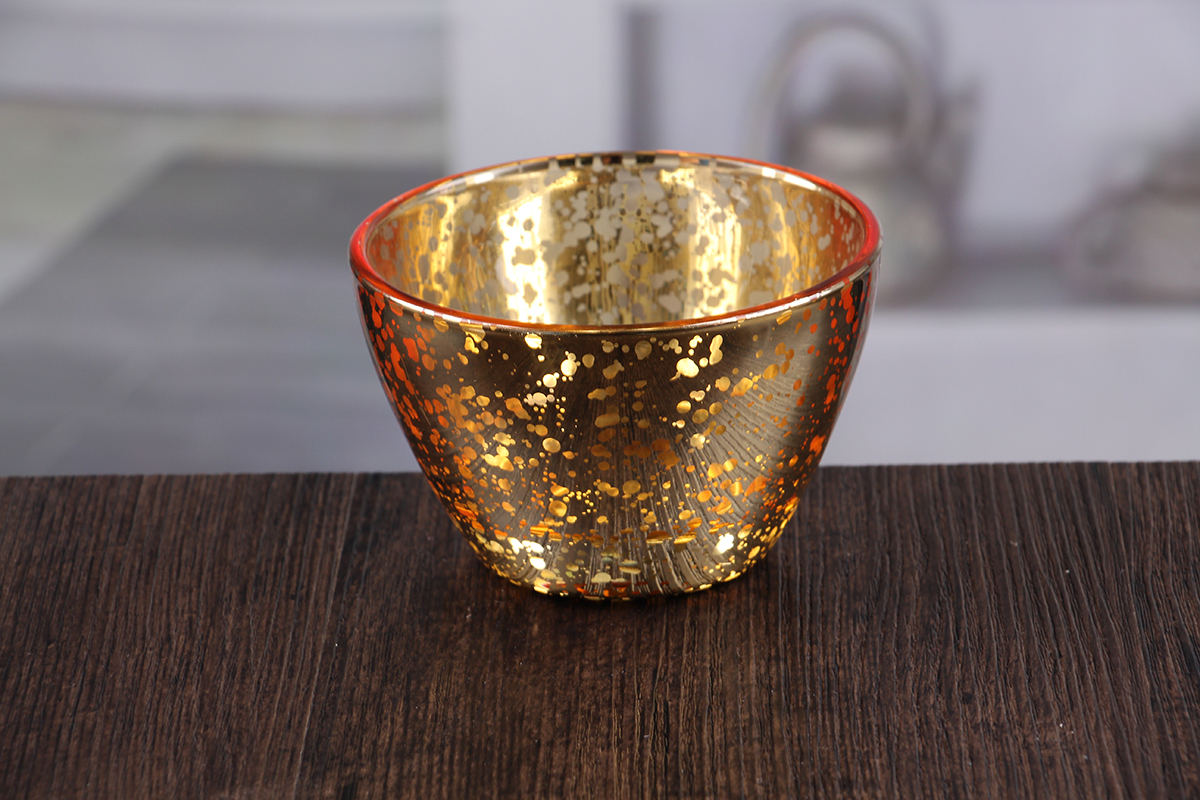 Glass bowl shaped candle holder