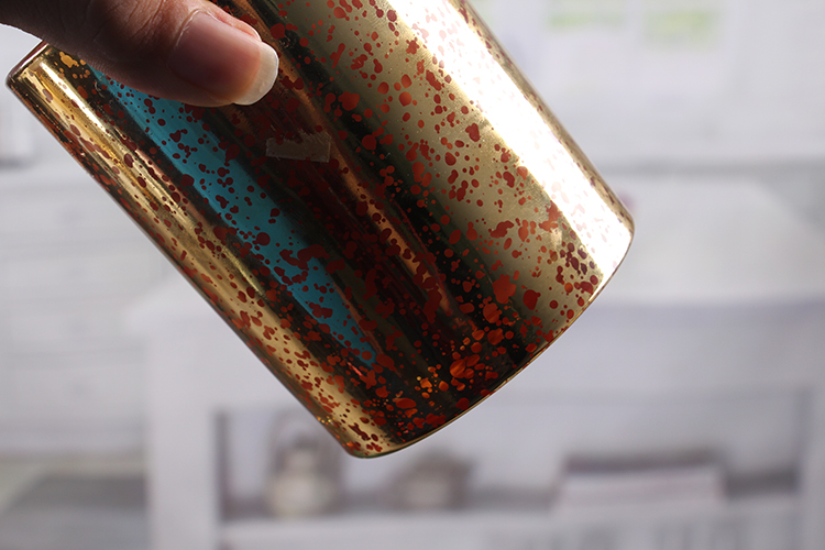 Golden votive candle holder