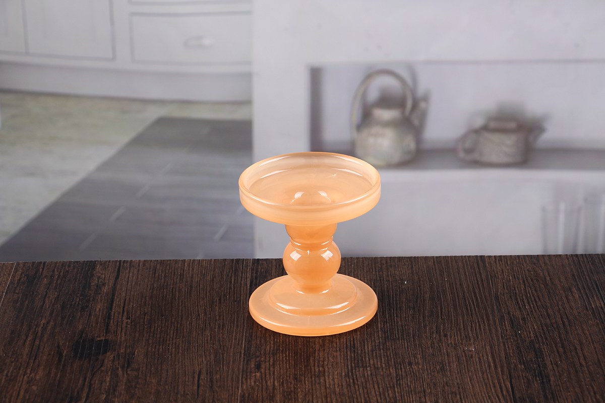 Orange glass candle holder