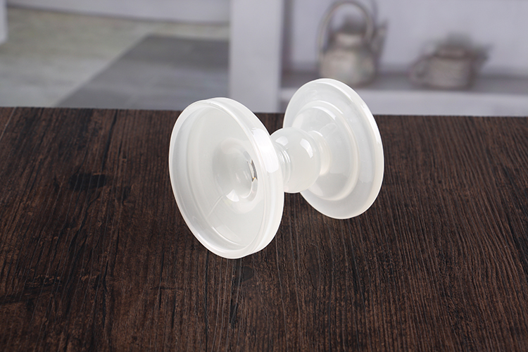 White pillar candle holders