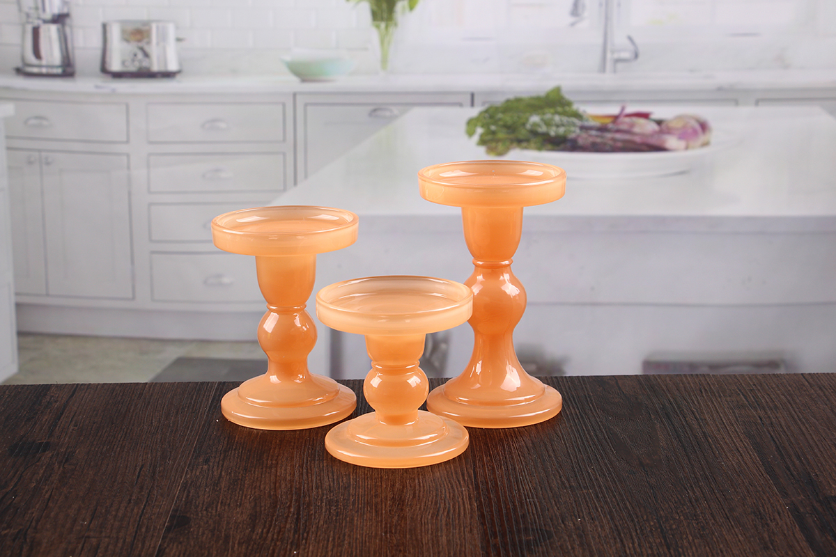 Orange glass candle holder
