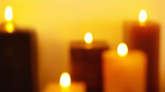 If a lit candle is placed in a container filled with liquid oxygen,what will happen?