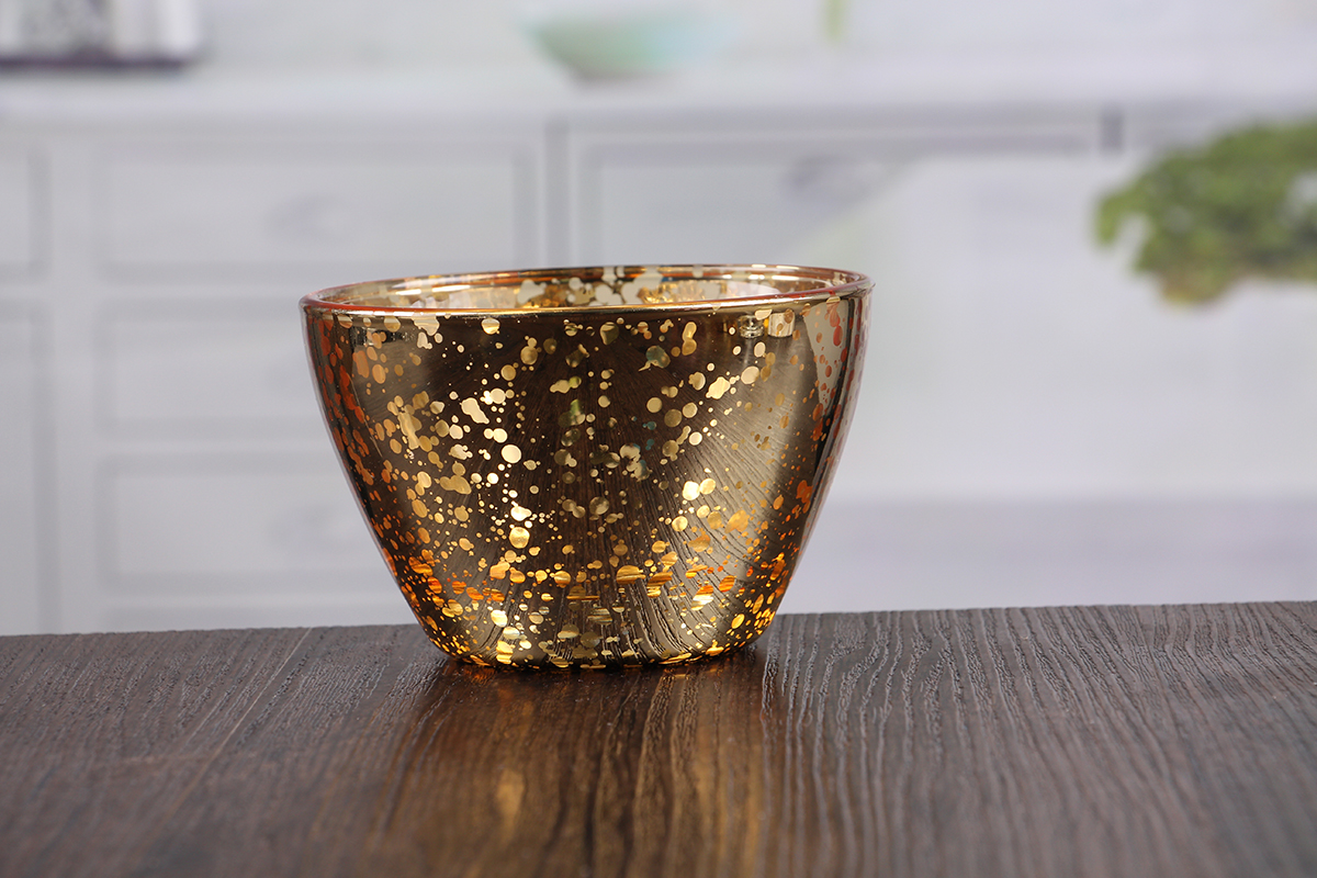 Glass bowl shaped candle holder