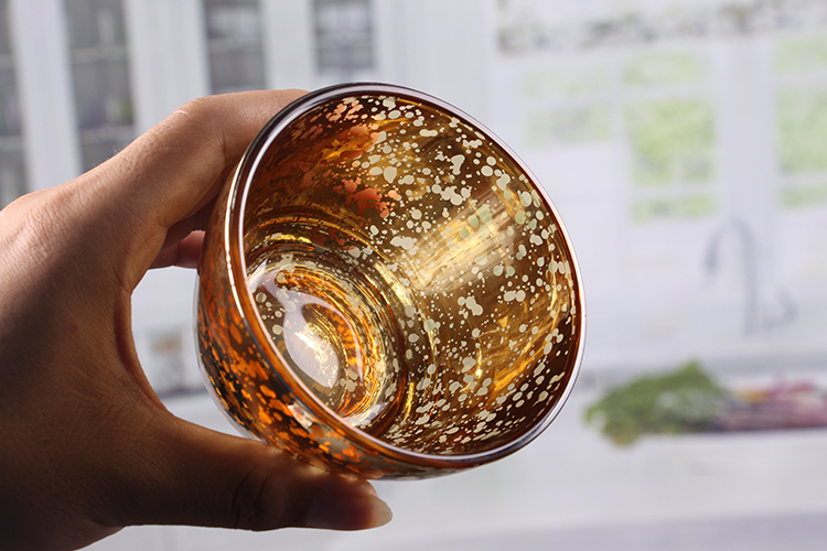 Glass bowl shaped candle holder