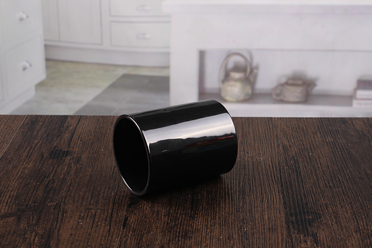 Black glass candle jars