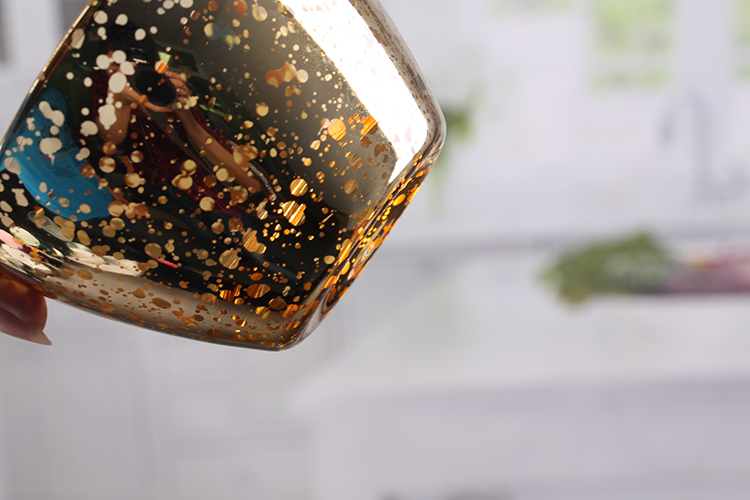 Glass bowl shaped candle holder