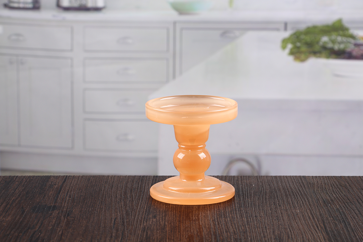 Orange glass candle holder