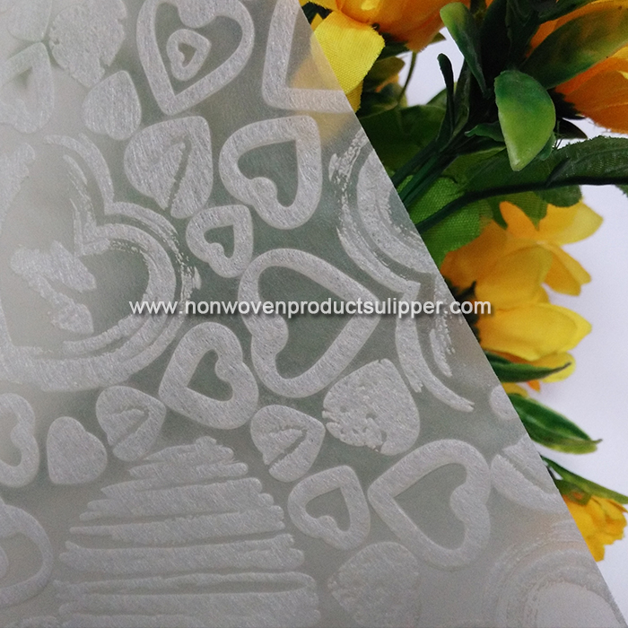 Light Yellow Heart-shaped Embossing GT-HSLIYE01 PP Spunbond Non Woven Custom Wrapping Paper On Sales